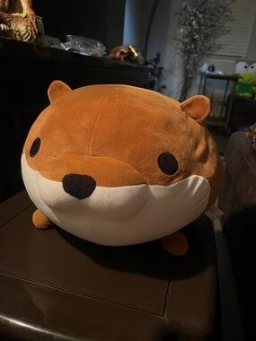 Takashoji Brown and white otter plushie . Big head